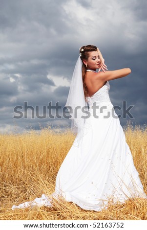 Bride to walk in a field