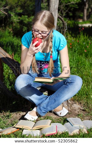 A student preparing for exams in nature