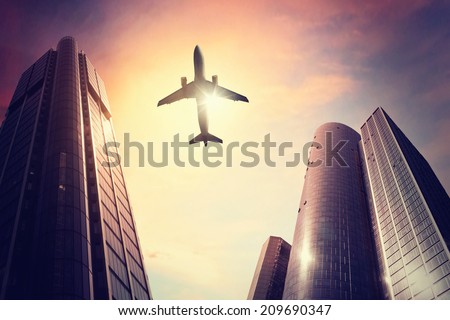 Plane over big city