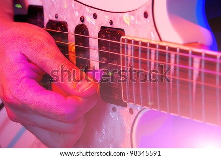 rockstar playing solo on guitar