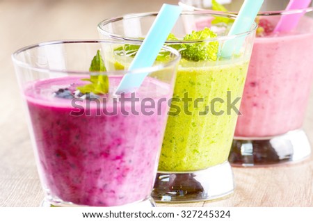 Healthy shakes on wooden table. Smoothie concept