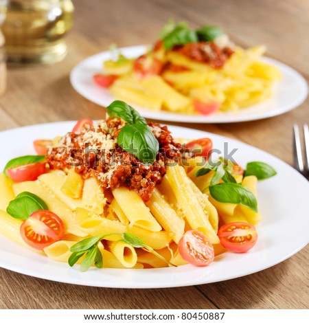 Penne pasta with a bolognese tomato beef sauce