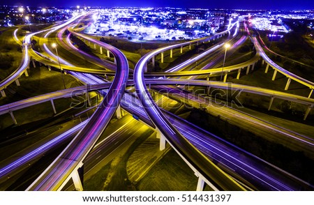 transportation highway system in America. time lapse , long exposure , urban sprawl interstate and interchange loops and turnarounds on highway 183 and Mopac expressway in Austin Texas