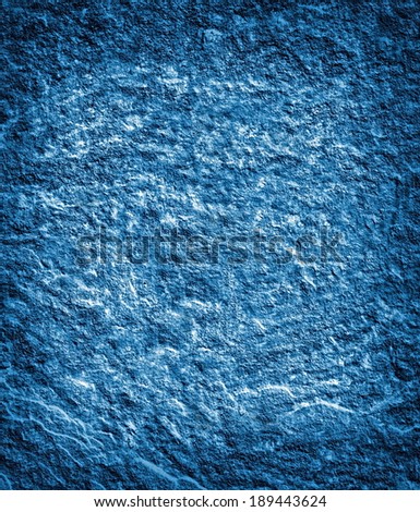 blue rock surface in focused light