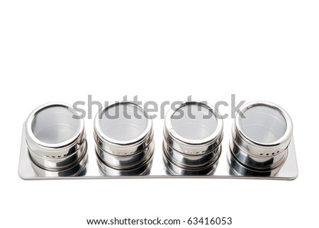 four metal spices rack isolated on white with clipping path