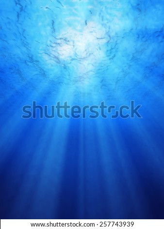 Blue ocean underwater light rays shining for backgrounds.