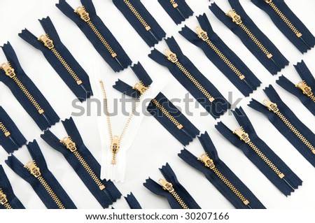 be daring, be different, be open-minded:  white open zipper among rows of closed blue ones, isolated on white background