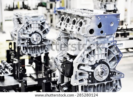 Production line for manufacturing of the engines in the car factory.