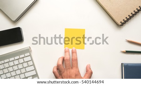 Office desk table keyboard and book note with pencil and post it on white background