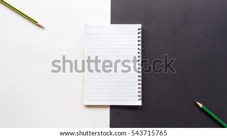 workspace desk with  notebook copy space background white and black