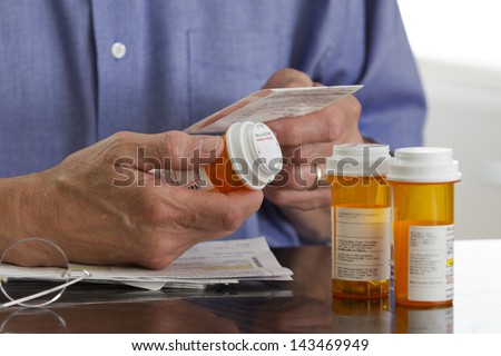 Older Man With Prescription Medications.
