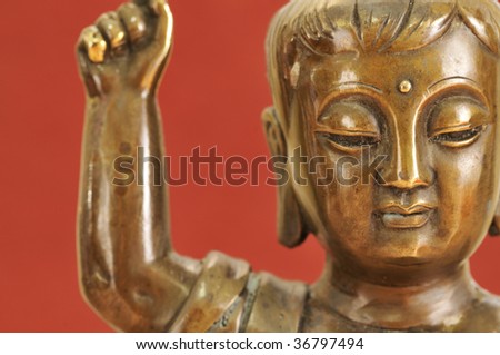 Buddhist statue. A Buddhist statue is an image at the age of the child.