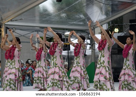 OSAKA, JAPAN - JUNE 24: Hula dance performance June 24, 2012, Osaka, Hawaiian hula dance is very popular in Japan, and it is performed all over the country by different artist groups.