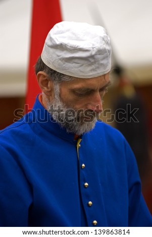 TATA, HUNGARY - MAY 25 : Turkish man in Patara Festival at May 25, 2013 in Tata, Hungary. This festival is to remember the siege of the castle against the Turkish in 1594.