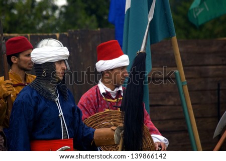 TATA, HUNGARY - MAY 25 : Medieval Turkish soldiers in Patara Festival at May 25, 2013 in Tata, Hungary. This festival is to remember the siege of the castle against the Turkish in 1594.