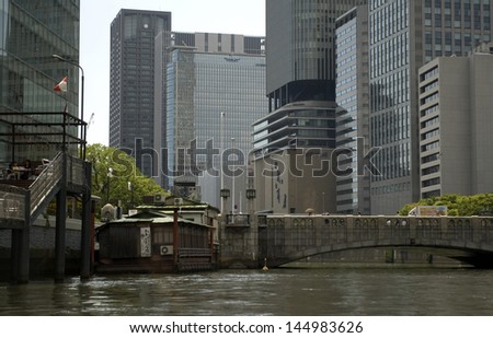 OSAKA, JAPAN - JUNE 17: View of the city at June 17, 2013, Osaka, Japan. Osaka is the second biggest city in Japan and the economical capital of the west part of the country.