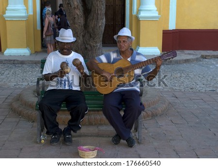 TRINIDAD, CUBA - JANUARY 26 : Musicians on 26 January, 2014, Trinidad, Cuba. Music is the part of life in Cuba, people play music and sing everywhere.