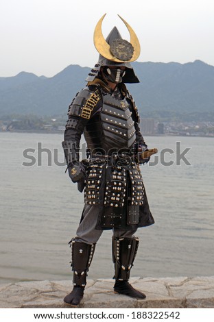 MIYAJIMA, JAPAN - APRIL 19:Japanese man in samurai costume on April 19, 2014 in Miyajima, Japan. Samurais were the soldiers in the shogun\'s army and they were feared all over Japan in the Middle Ages.