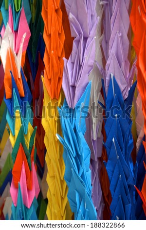 HIROSHIMA, JAPAN - APRIL 19: Paper cranes on April 19, 2014, Hiroshima, Japan. Japanese children make cranes from origami to remember the children victims of the nuclear attack.