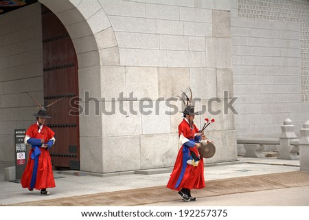 SEOUL, SOUTH KOREA - MAY 11: Royal guards on May 11, 2014, Seoul, South Korea. Guards in medieval clothes had been protected the Gyeongbok Palace for centuries. This palace is a world heritage site.