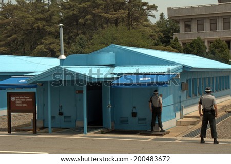 PANMUNJOM, SOUTH KOREA - MAY 17: Korean soldiers in the Joint Security Area on May 17, 2014 in Panmunjom, South Korea. The armistice agreement was signed in 1953 which divided Korea in two parts.
