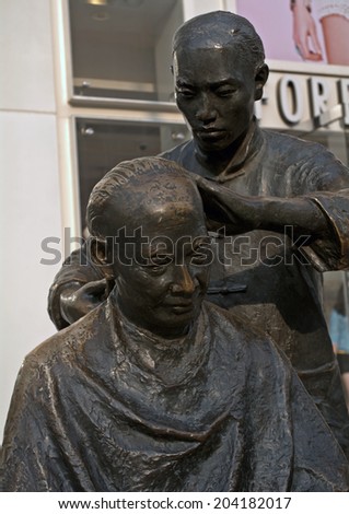 BEIJING, CHINA - JUNE 5: Statue in the downtown on June 5, 2014, Beijing, China. Beijing\'s center is full of statues of medieval motives.