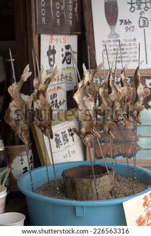 TAKAYAMA, JAPAN - SEPTEMBER 29: Fried fish at the market at September 29, 2014 in Takayama, Japan. Takayama is a river town famous for its fish food.