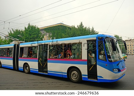 NORTH KOREA, PYONGYANG - JUNE 11: City bus at June 11, 2014 in Pyongyang, North Korea. Pyongyang receives new and modern buses from China