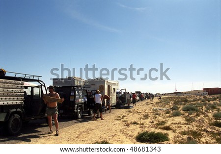 WESTERN SAHARA - JANUARY 3: Participants of Budapest - Bamako Rallye are crossing the border into Mauritania at January 3, 2006 in Western Sahara