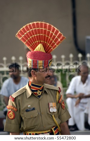 ATTARI, INDIA - MAY 1: Indian guard at the Indian - Pakistani border during the border closing ceremony at May 1, 2010 in Attari, Punjab, India.