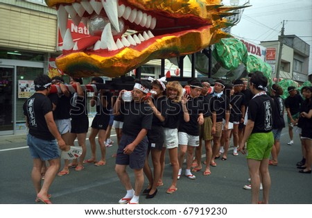 AMARUME, JAPAN - SEPTEMBER 15: Dragon Festival at September 15, 1993 in Amarume, Japan. Festivals with dragons are numerous in Japan. They are related to the Shinto religion. Every city has its own festival.