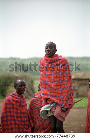 MAASAI MARA, KENYA - FEBRUARY 4: Maasai morani\'s numba dance, 4 February , 2004 at Masaai Mara, Kenya. The Maasai are the most famous tribe in Africa. They are nomadic and live in small villages.