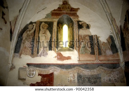 CSARODA, HUNGARY - APRIL 21 : Medieval paintings on the wall at April 21, 2011 in Csaroda, Hungary. Scenes from the Bible are painted in these very unique churches in Szatmar County of Hungary.