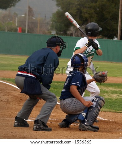 baseball catcher with umpire and batter