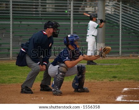 Baseball catcher with umpire