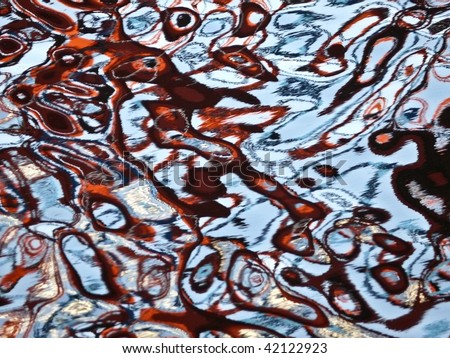 Blue and red swirling pattern suitable for background