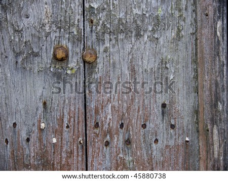 Detail of old wooden french barn doors