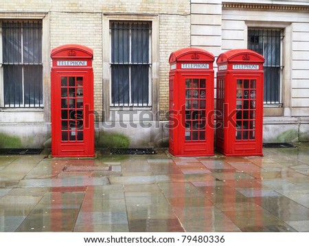 Three red london telephone boxes