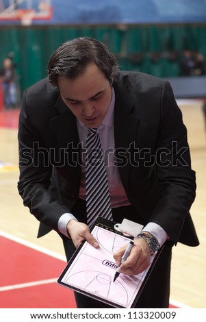 SAMARA, RUSSIA - MARCH 14: Time out. Coach of BC Enisey Milan Kotaratc says the game plan against BC Krasnye Krylia on March 14, 2012 in Samara, Russia.
