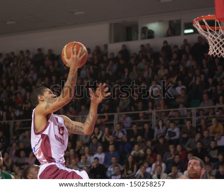 SAMARA, RUSSIA - DECEMBER 02: Chester Simmons of BC Krasnye Krylia with ball attacks a basket during a BC UNICS game on December 02, 2012 in Samara, Russia.
