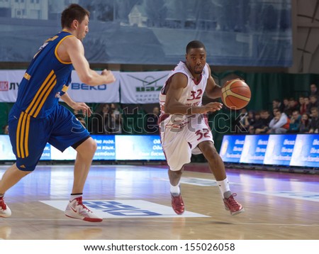 SAMARA, RUSSIA - DECEMBER 17: Aaron Miles of BC Krasnye Krylia with ball tries to go past a BC Khimki player on December 17, 2012 in Samara, Russia.