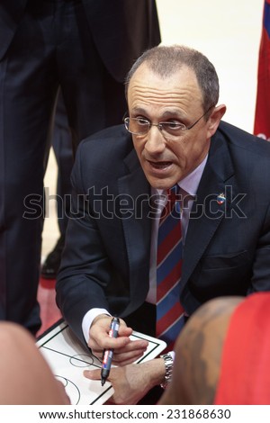 SAMARA, RUSSIA - APRIL 21: Time out. Coach of BC CSKA Ettore Messina says the game plan against BC Krasnye Krylia on April 21, 2013 in Samara, Russia.