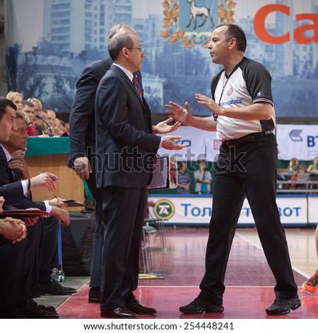 SAMARA, RUSSIA - MAY 19: Head coach of BC CSKA Ettore Messina disputes with the referee at the game against BC Krasnye Krylia on May 19, 2013 in Samara, Russia.