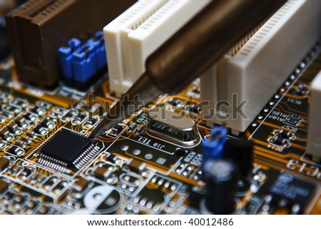 Repair electronic circuit board with soldering iron