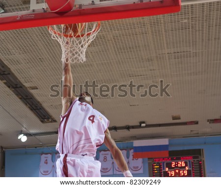 SAMARA, RUSSIA - MAY 11: Brion Rush of BC Krasnye Krylia with ball makes slam dunk in a game against BC Enisey on May 11, 2011 in Samara, Russia