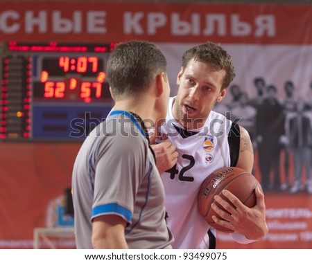 SAMARA, RUSSIA - NOVEMBER 19: Fedor Likholitov of BC Krasnye Krylia disputes with the referee at the game against BC CSKA on November 19, 2011 in Samara, Russia.