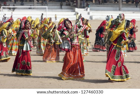 PUSHKAR, INDIA - NOVEMBER 21:  An group of unidentified girls in colorful ethnic attire attends at the Pushkar fair on November 21, 2012 in Pushkar, Rajasthan, India.