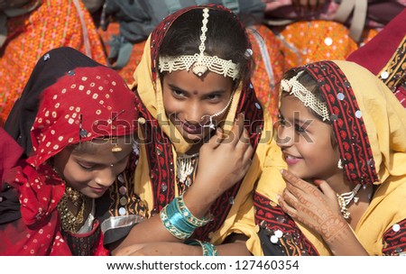 PUSHKAR INDIA NOVEMBER 21 An unidentified group of girls in colorful ethnic attire attends at the Pushkar fair on November 21 2012 in Pushkar Rajasthan India PUSHKAR INDIA NOVEMBER 21 An unidentified group of girls in colorful ethnic attire attends at the Pushkar fair on November 21 2012 in Pushkar Rajasthan India