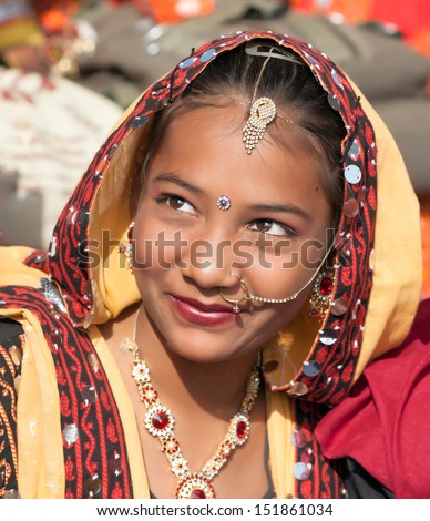 Pushkar, India - November 21: An Unidentified Girl In Colorful Ethnic Attire Attends At The Pushkar Fair On November 21, 2012 In Pushkar, Rajasthan, India.