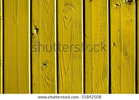 Painted wooden boards in yellow colours. Background.